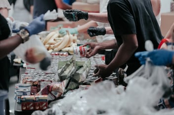 Volunteers assembling food packages